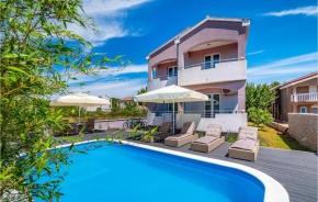 Amazing home in Pasman with 7 Bedrooms, Outdoor swimming pool and Heated swimming pool